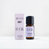 Luck Uçucu Yağ Karışımı şişesi ve kutusu; %100 Karanfil, Tarçın ve Portakal uçucu yağları içerir; kozmetik değildir.